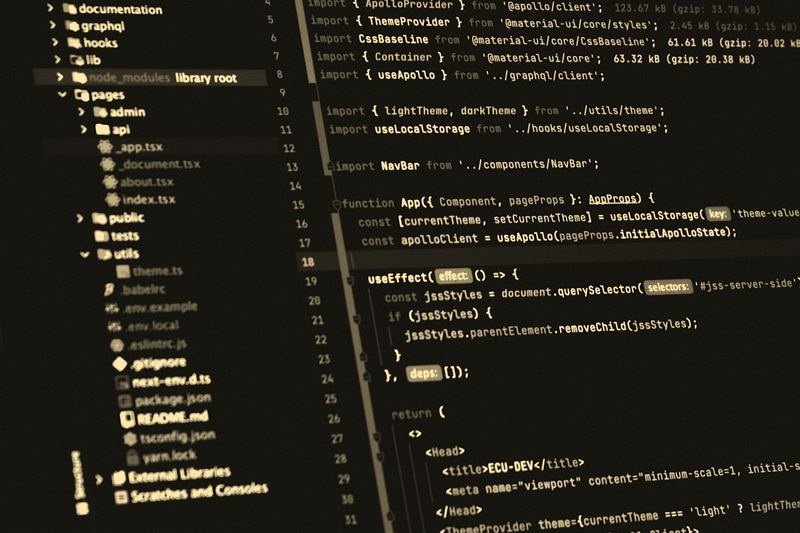 A code editor window full of source code on a dark screen, no people